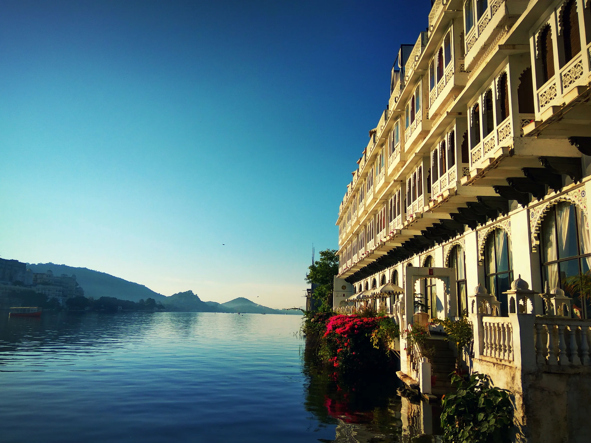 Coastal cliffside hotel overlooking the Mediterranean at golden hour