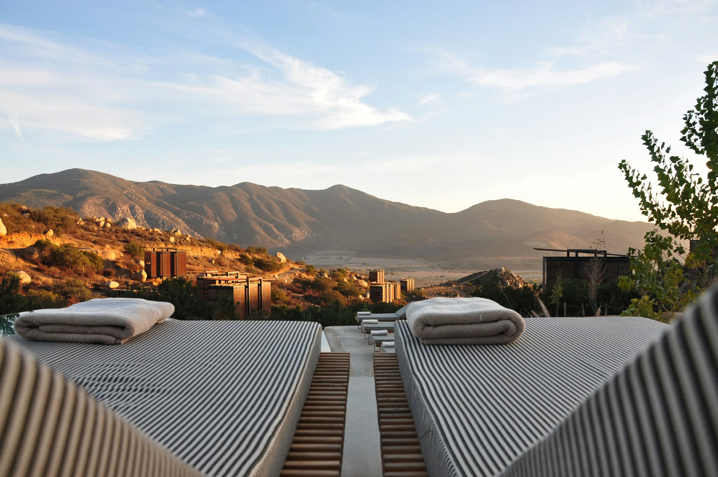 Luxury hotel lobby with refined architecture and warm natural light